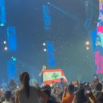 «تامر حسني يشكر منظمي الحفل ويعوض الجمهور بالغناء الإضافي»